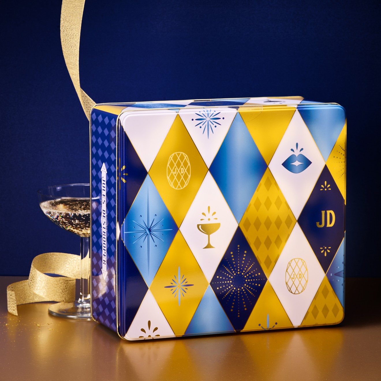 Quatre Mains package design - champagne, festive